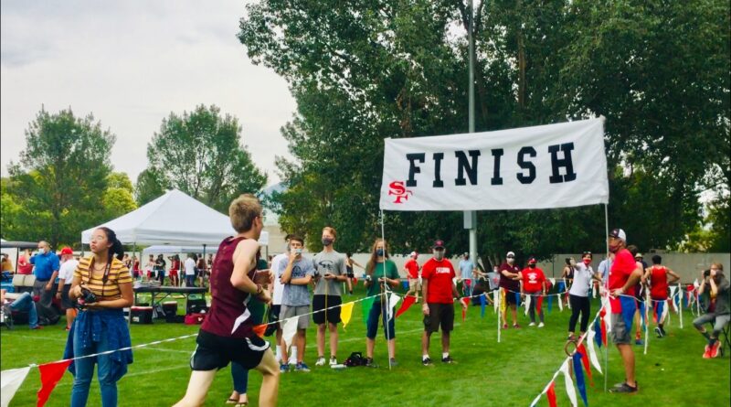 David Samuelson, a member of the Cross Country team, approaches the finish line at the Spanish Fork meet.